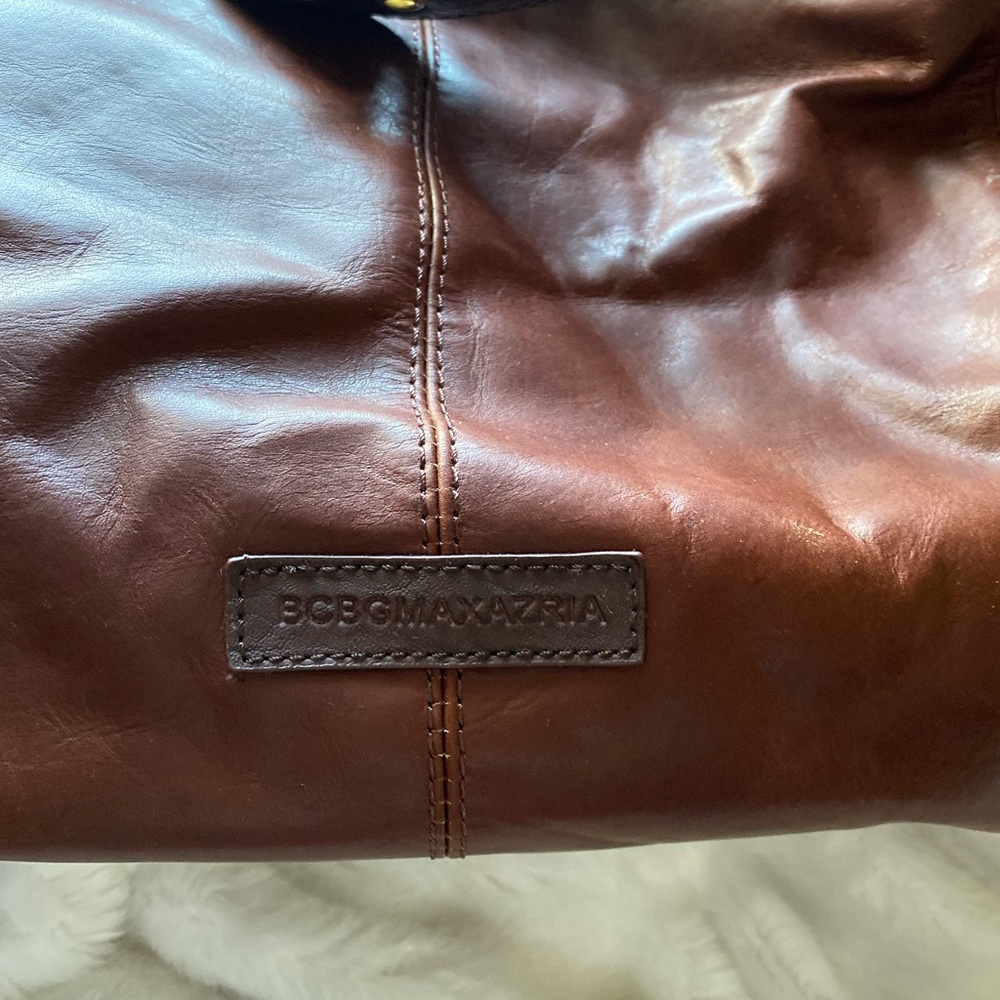 Brand new BCBG Max Aria tote bag. Chestnut leather! Top has a drawstring.